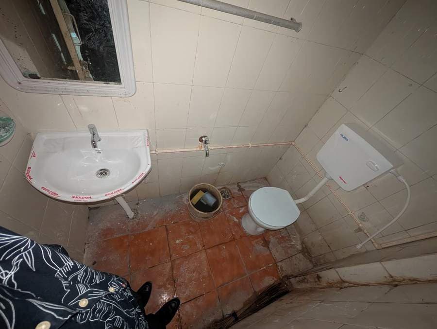 Sample collection room waste pipe – before renovation