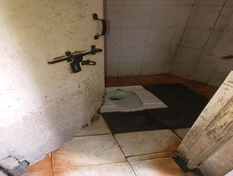 Parking-Side Toilet — before renovation
