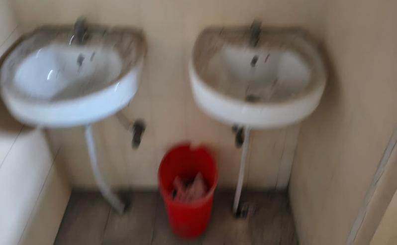 Common Wash Room Left Lobby — before renovation